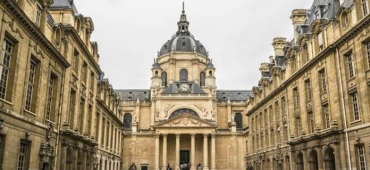 The courtyard of the Sorbonne, a stone university building with a domed chapel