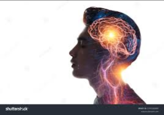 Silhouette with glowing brain